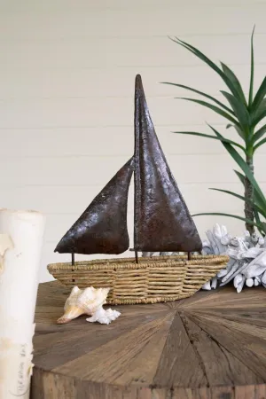 Seagrass Boat with Rustic Hand-Hammered Metal Sail