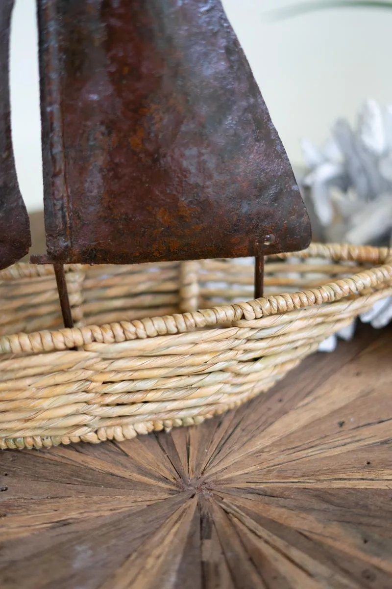 Seagrass Boat with Rustic Hand-Hammered Metal Sail